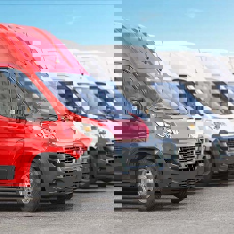 Red Delivery Van In A Row Of White Vans Best Expr 2021 08 31 08 29 14 Utc