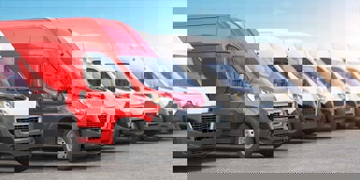 Red Delivery Van In A Row Of White Vans Best Expr 2021 08 31 08 29 14 Utc